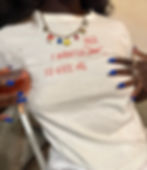 Person wearing a white tee that says I wanted to kiss her