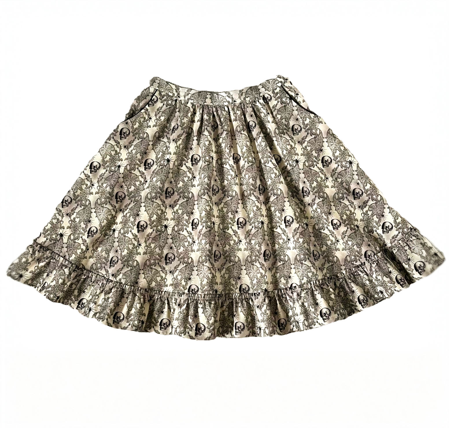 handcrafted cotton skirt with pockets and frilled hemline in skulls and lace print in colours of vintage beige and black