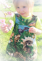 Play dress in dinosaur print cotton fabric by handcrafted by Lavish Lilac