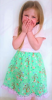 little girl wearing handcrafted frilled skirt by Lavish Lilac