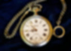 Restored antique gold pocket watch with a new crystal.