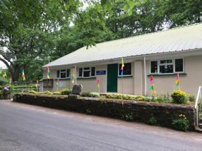 Celebratory flags outside the hall