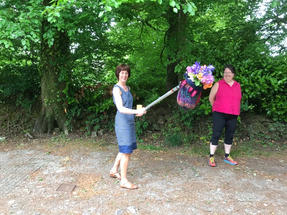 Justine and Rose ready with the socially distanced flowers