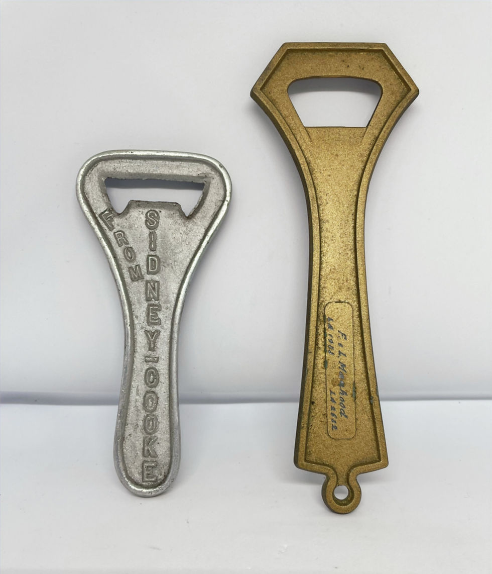 Two vintage bottle openers