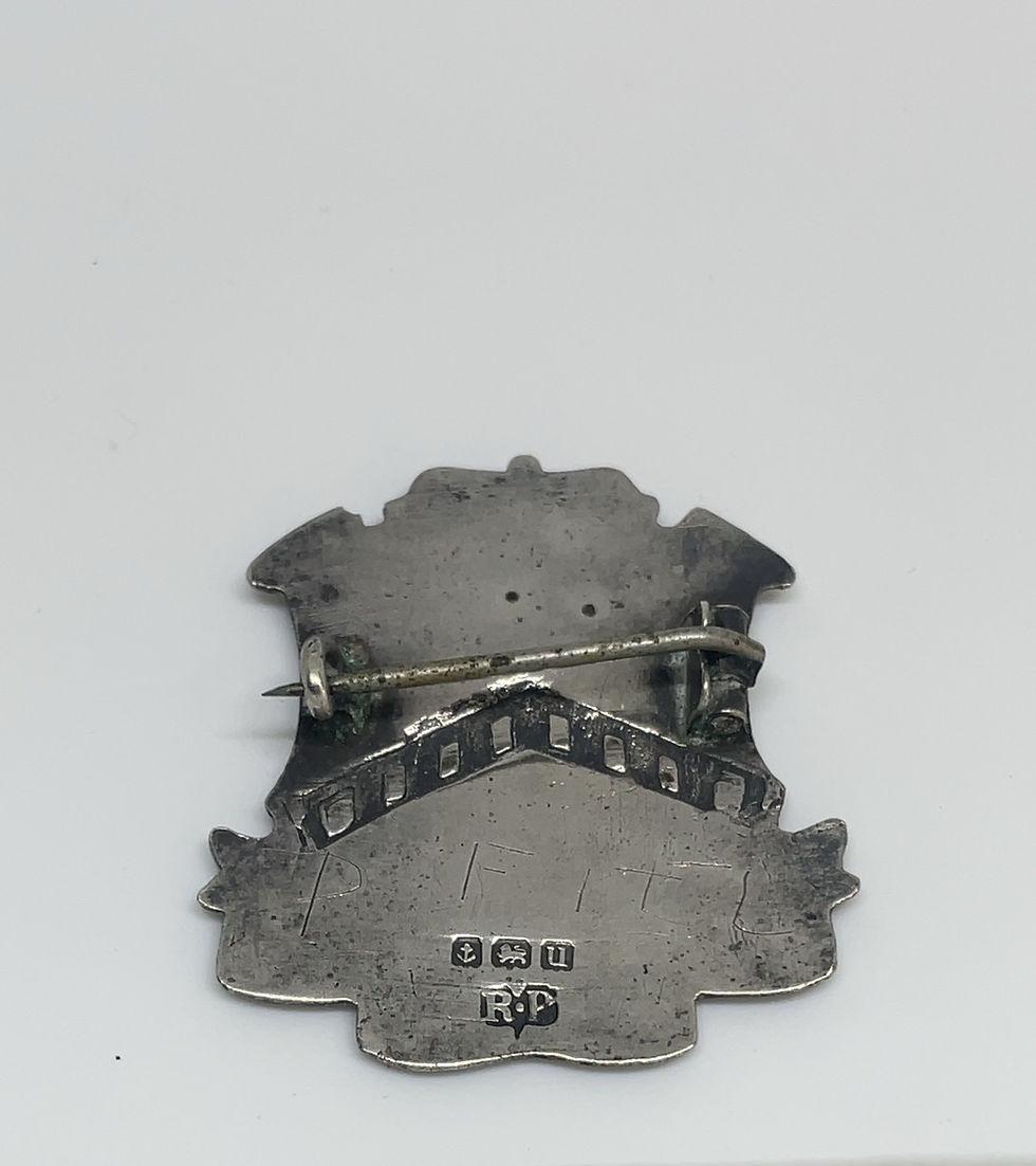 Thumbnail: vintage silver school badge