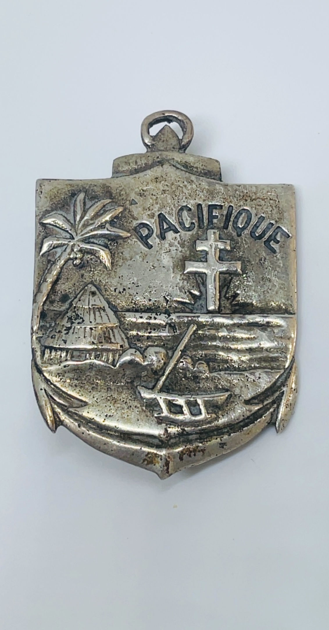 silver military badge