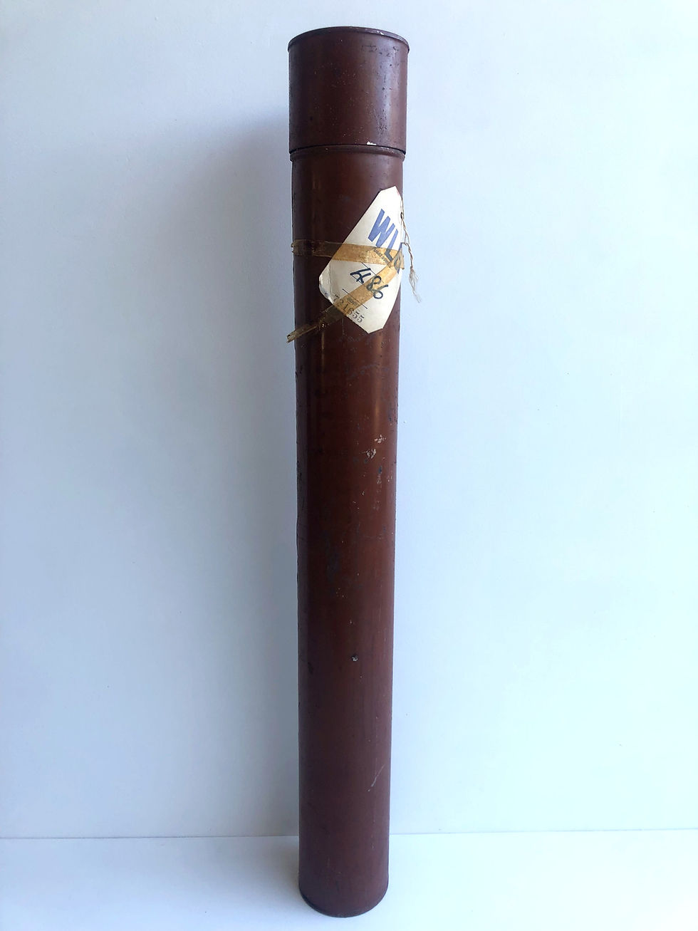 Thumbnail: Vintage brown document storage tube.