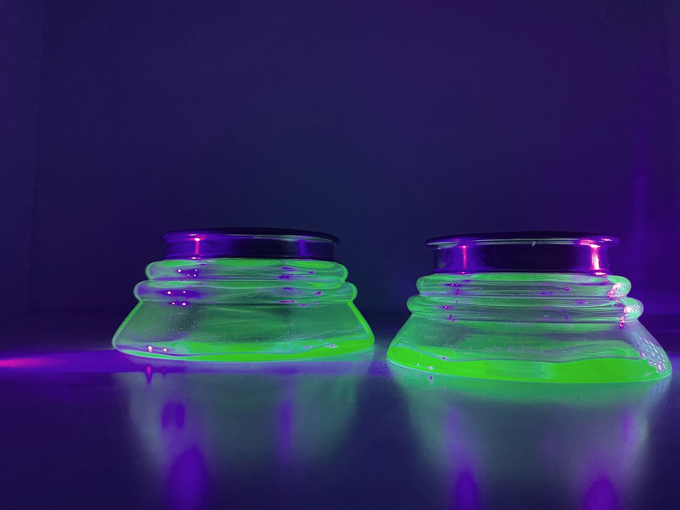 Thumbnail: Uranium green glass jars with lids