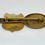 Thumbnail: gold tennis racquet brooch