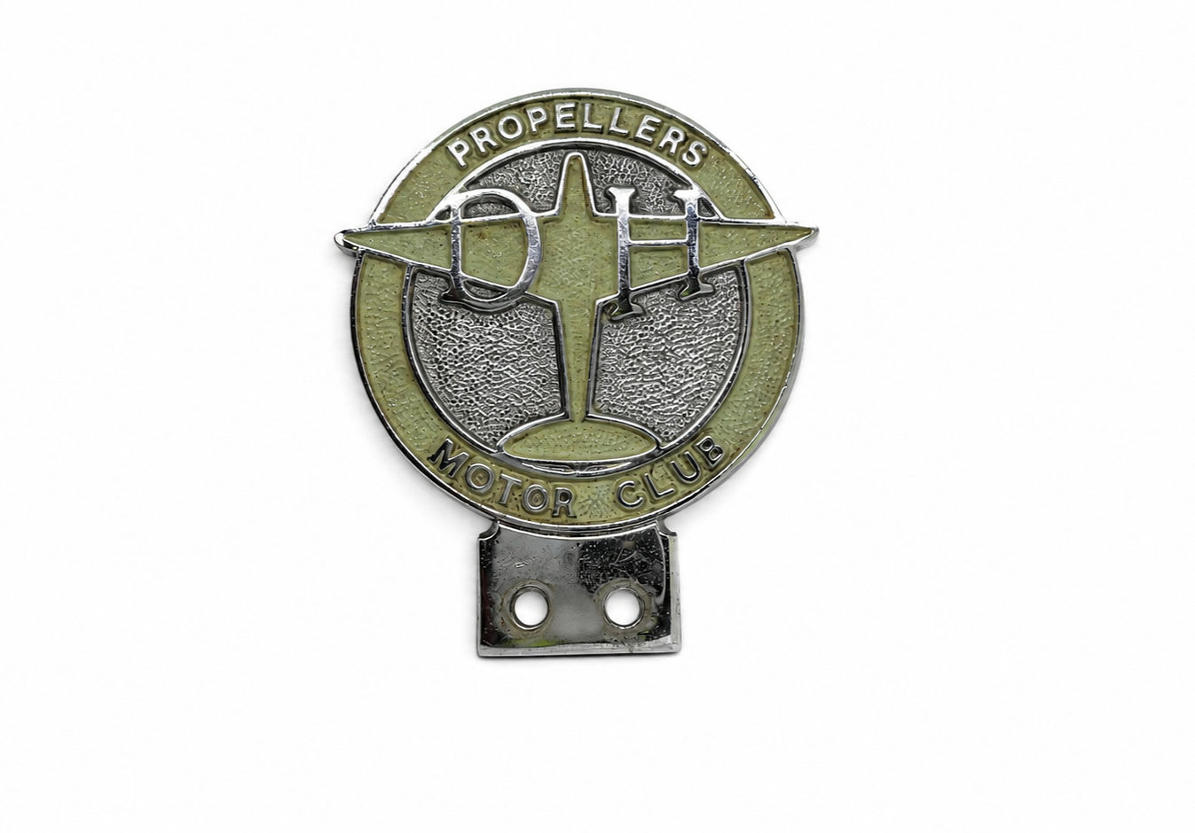circular chrome vintage car badge