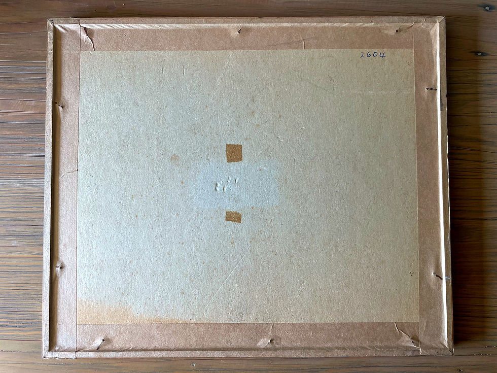 back view of a framed painting