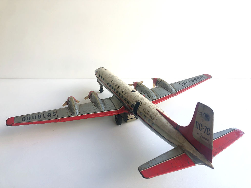 Thumbnail: vintage tin aeroplane toy