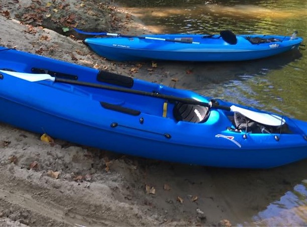 blue kayaks_edited.png.webp