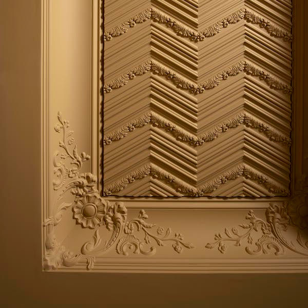 Orac decor W130 Chevron 3D wall panel, painted in a beige. Classic panelling.