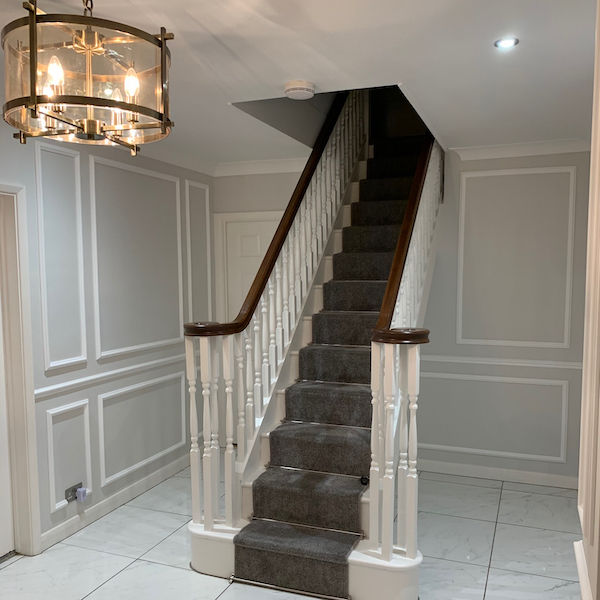 PX120 wall panelling installed in a hallway with stairs