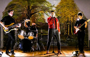 Anna Tero singing as a front woman for a pop indie rock band in Melbourne