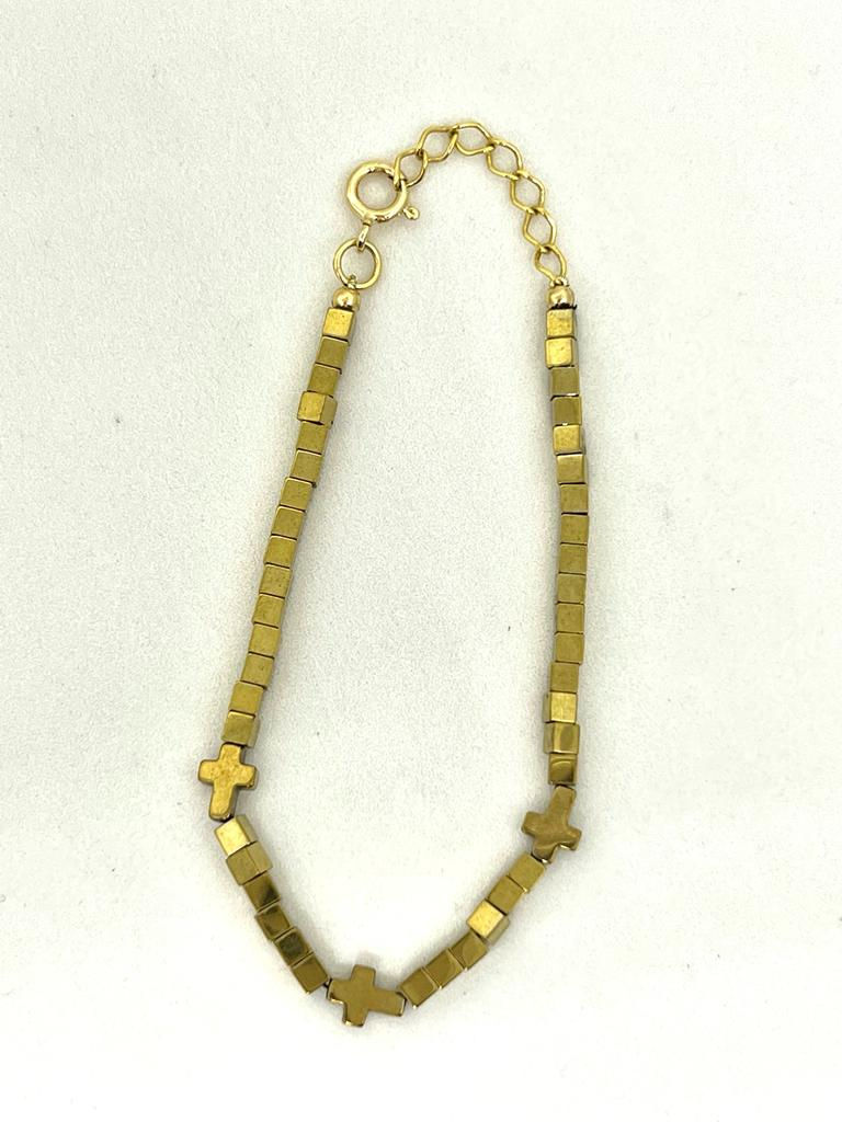 Pulseira de Hematitas douradas com hematita formato cruz dourada