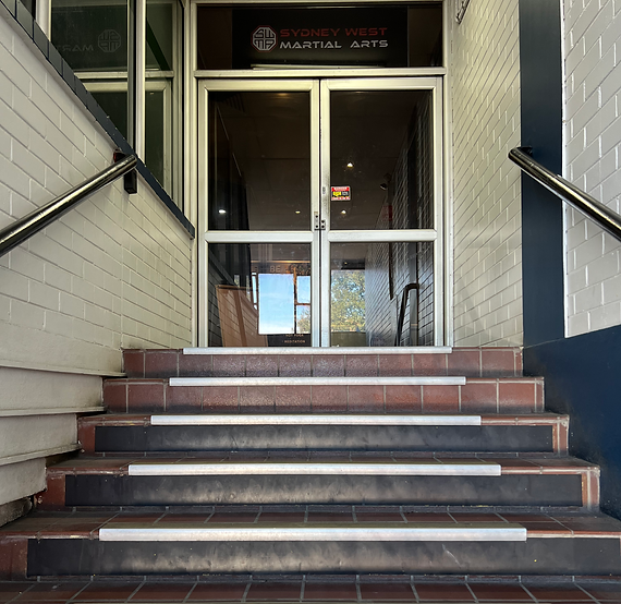 Sydney West Martial Arts front door stairs to success