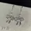 Thumbnail: Sparkling Crystal Clear Bow Charm Earrings: Silver 925