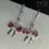 Thumbnail: Sparkling Cerise Pink Bow Charm Earrings: Silver 925