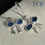 Thumbnail: Sparkling Royal Blue Bow Charm Earrings: Silver 925