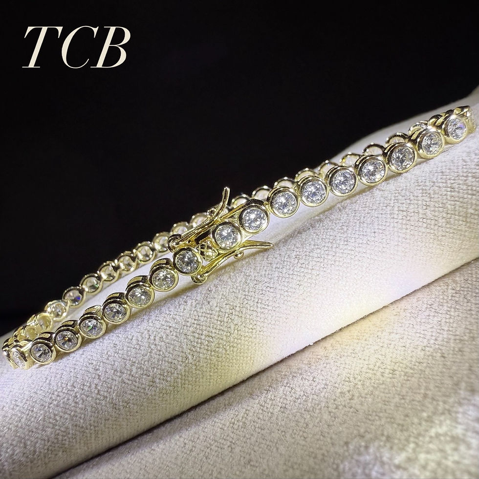 Thumbnail: 14K gold plated sterling silver tennis bracelet featuring bezel-set cubic zirconia stones