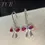 Thumbnail: Sparkling Cerise Pink Bow Charm Earrings: Silver 925