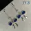 Thumbnail: Sparkling Royal Blue Bow Charm Earrings: Silver 925
