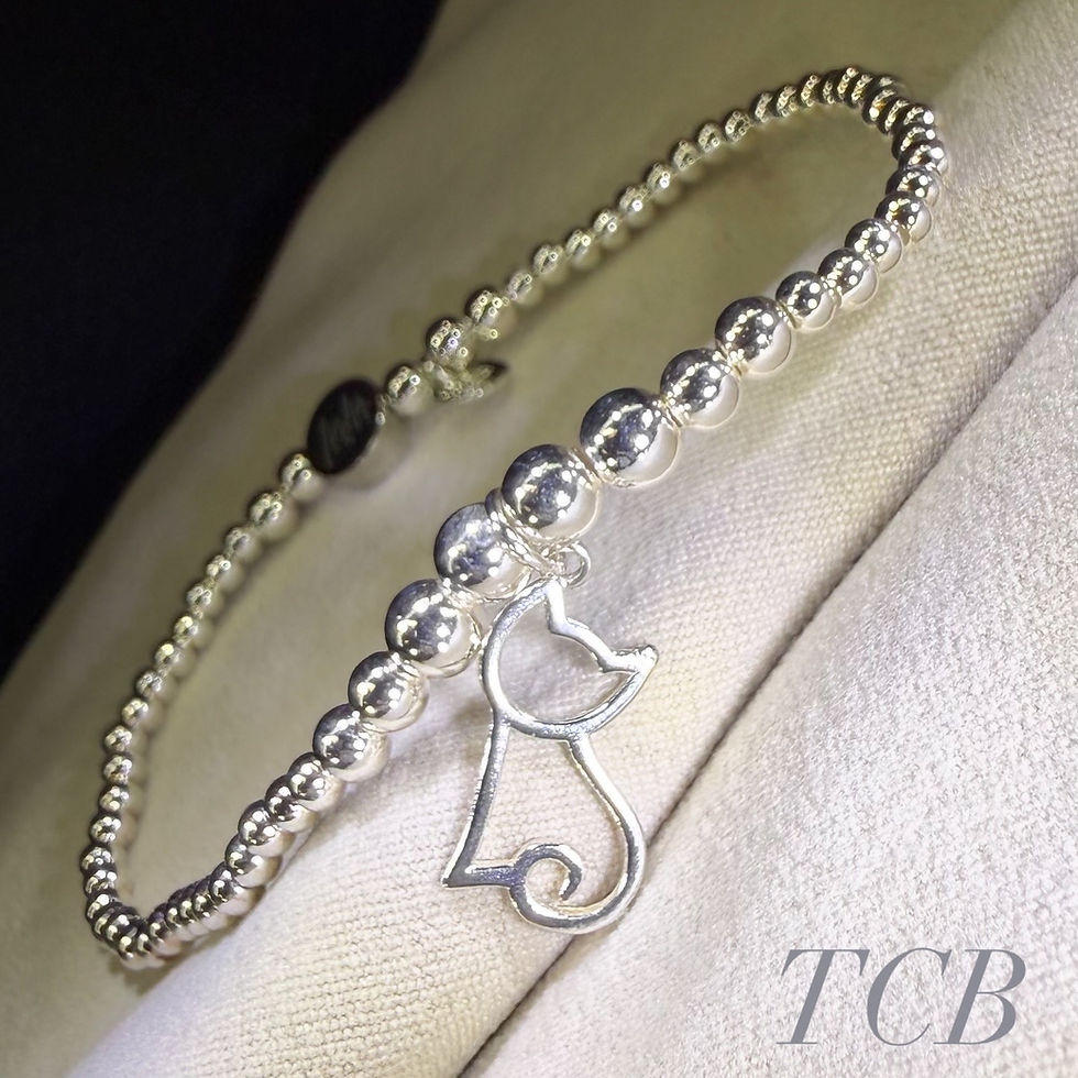 Thumbnail: Handmade sterling silver beaded bracelet featuring a cut-out cat charm crafted from Sterling Silver 925