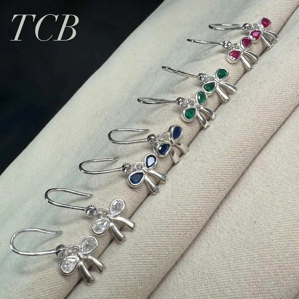Thumbnail: Sparkling Royal Blue Bow Charm Earrings: Silver 925