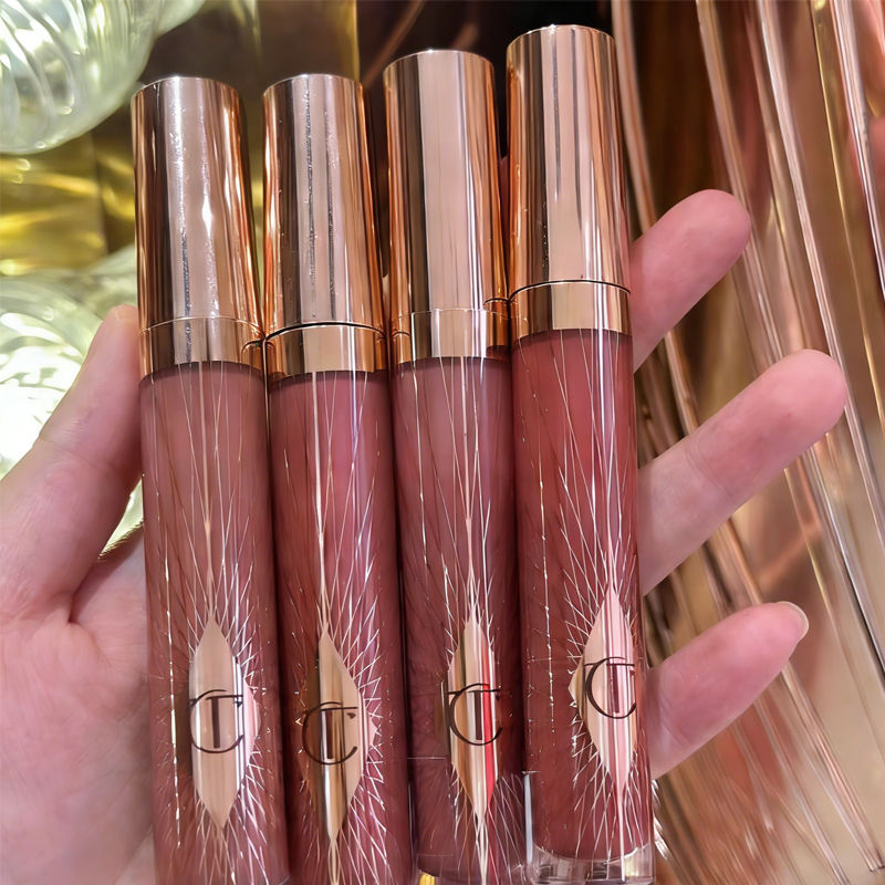 Thumbnail: Charlotte Tilbury Sheer Cool-toned Pink Lipstick Lip Gloss Mirror Water Bedside 