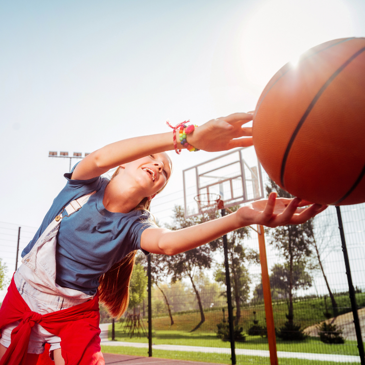 kid playing basketball at sports values