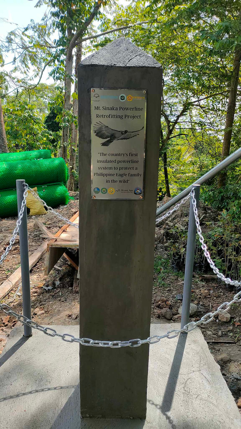 Project marker of the country's first Powerline Retrofitting Project in Mt. Sinaka, North Cotabato. Supported by Suntory and the Cotabato Electric Cooperative, the initiative covers a total of 3 kilometers of power lines and aims to reduce electrocution risks to Philippine Eagles by improving the safety of existing electrical infrastructure.