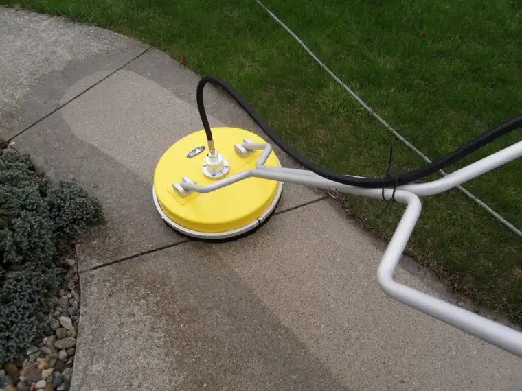 A driveway pressure washed clean