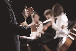 Orchestra conductor on stage