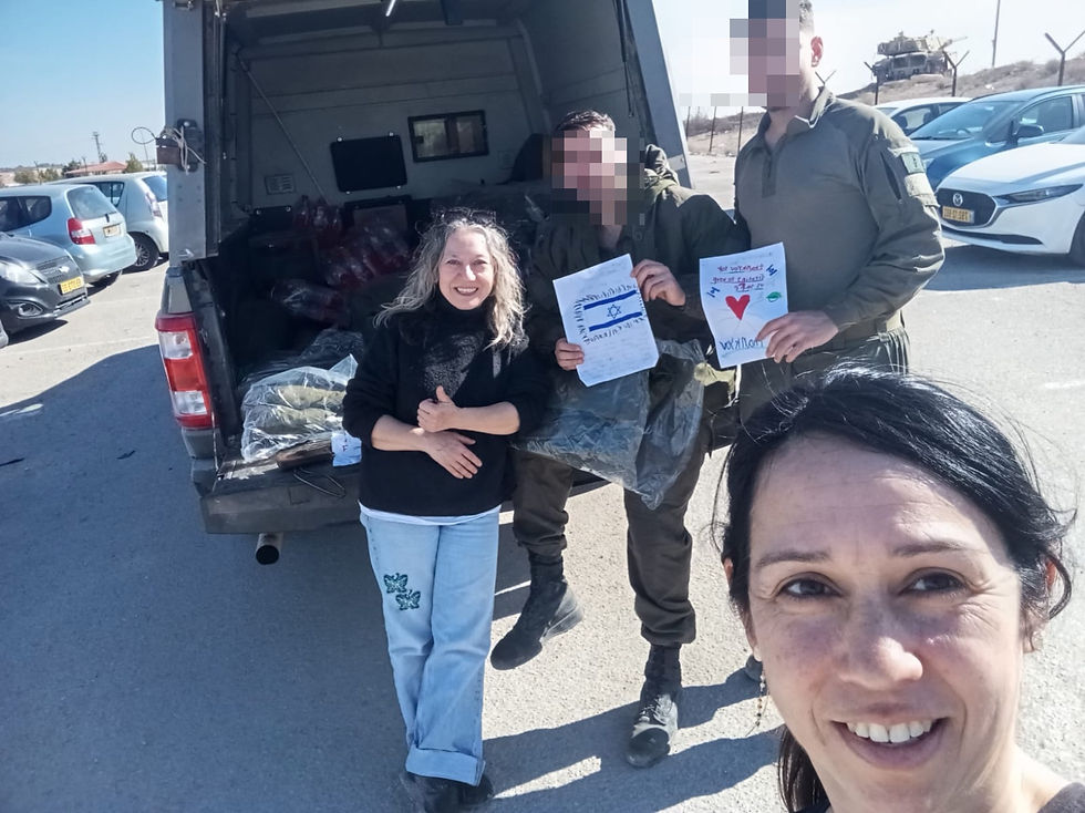 Team Help Israel Now with soldiers from Golani Brigade. We also gave them homemade cards from children that I teach in Jerusalem as well as from Believers from the United States! As you can see they loved them!