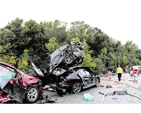 Date of accident photo of a vehicle pile up.