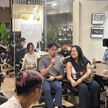 Attendees networking and conversing in small groups after the SQ Collective's AI Agents Need Identity event.