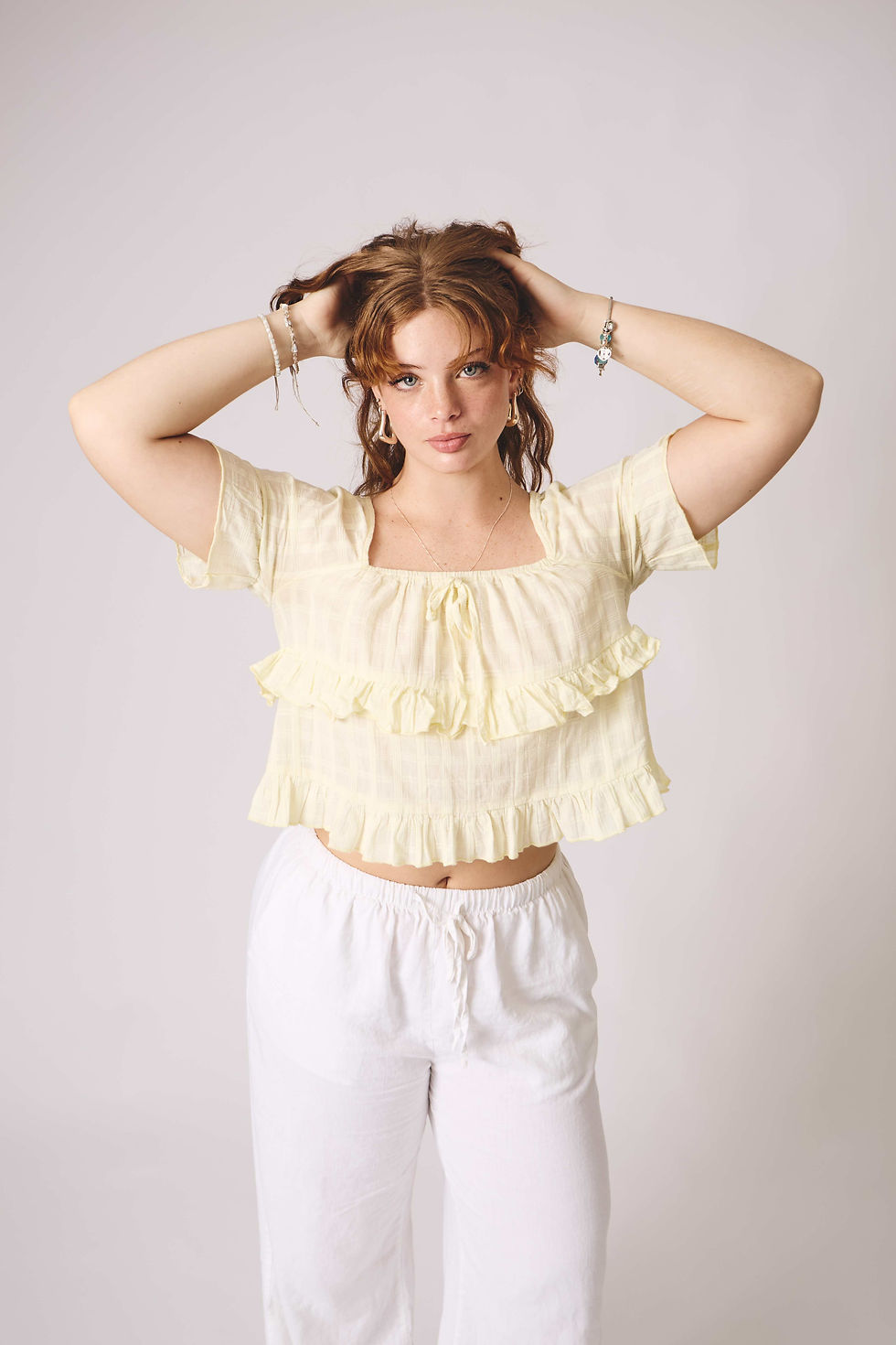 Pastel yellow frilly top