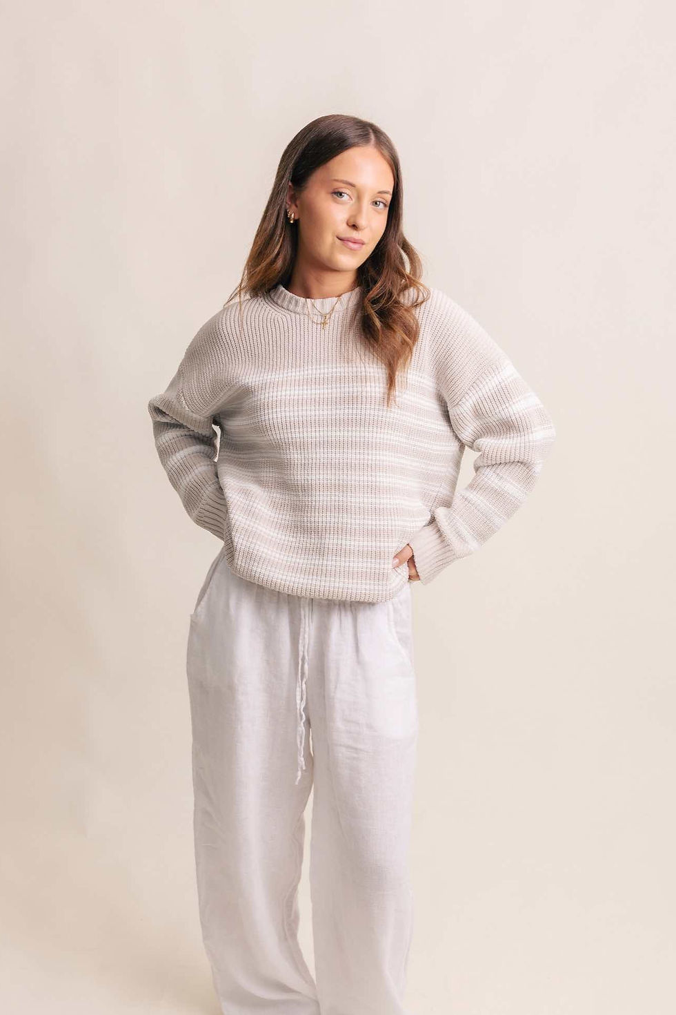 Thumbnail: Beige and white striped knit sweater