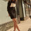 Thumbnail: A Ribbed Knit Sweater Mini Dress