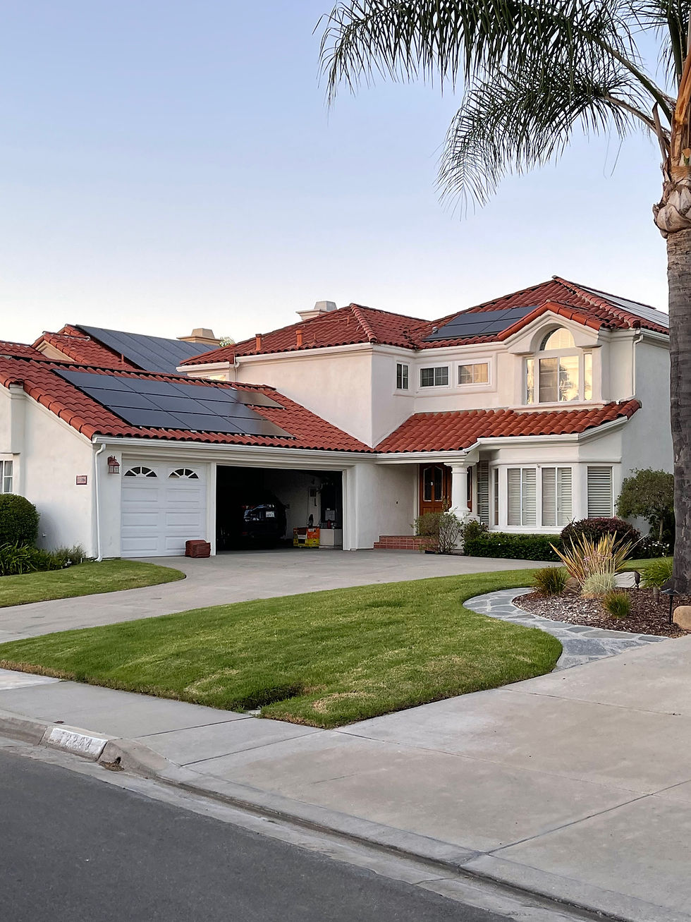 Residential home equipped with rooftop solar panels