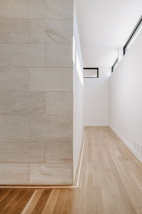Hallway with hardwood floor