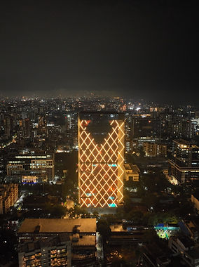 Parinee I commercial building illuminated facade Andheri West Mumbai night view