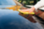 close-up-person-cleaning-car-exterior.jpg