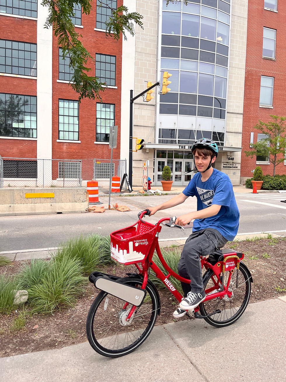 SMI Cornell Highroad Fellow, Jessie trying the Clip on a Reddy Bike