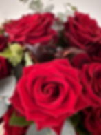 a close up of 24 Large Velvety Red Roses