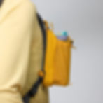 the side of a Fjallraven - Abisko Bottle Pocket when attached to the strap of a rucksack