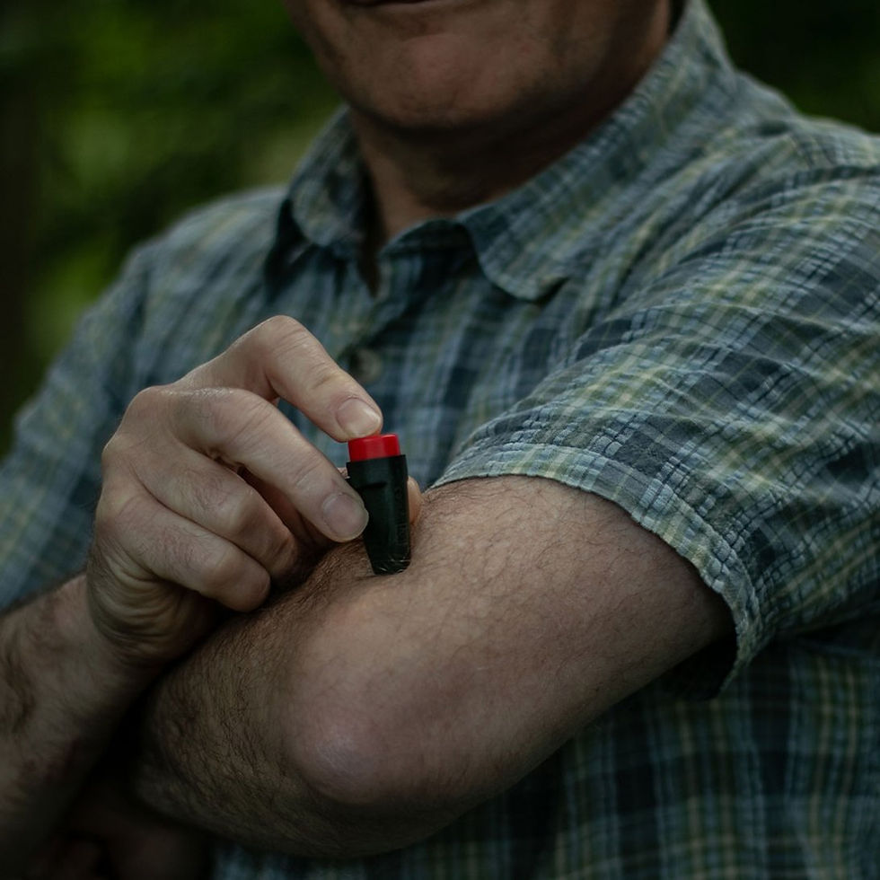 Lifesystems - Mini Bite Relief Click - man using kit