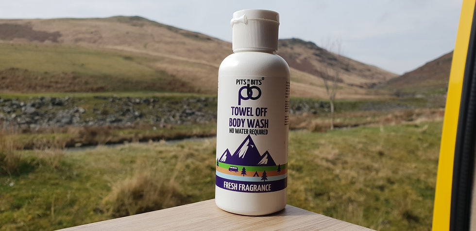 Pits and Bits Towel Off Body Wash 100ml pictured in the landscape mountains